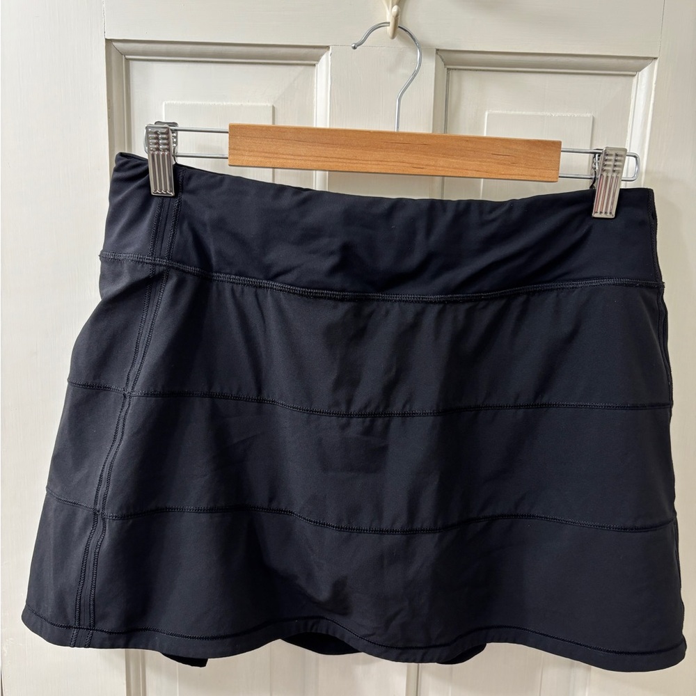 Lululemon black Pace Rival mid-rise skort. 
Size 8 Tall